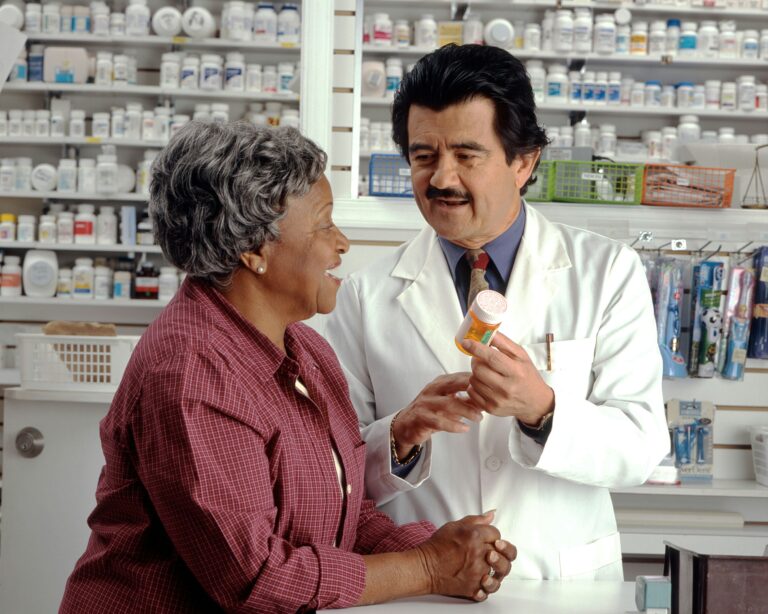 Pharmacist helping customer
